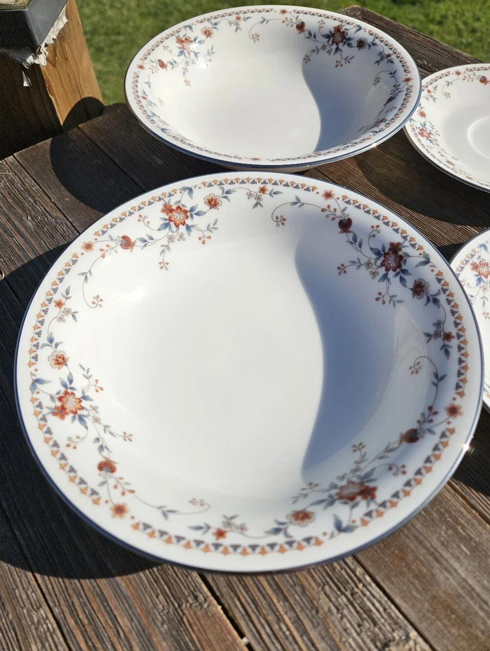Noritake White Porcelain Dinnerware with Orange Floral Border